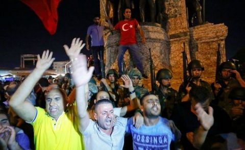 People-demonstrate-in-front-of-the-Republic-Monument-at-the-Taksim-Square-in-Istanbul