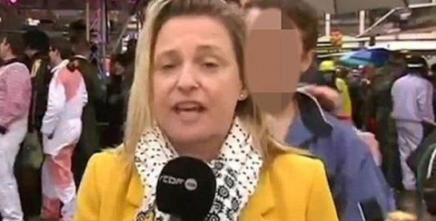 Jurnalistă belgiană agresată sexual de un musulman în timp ce transmitea în direct de la Koln. Refugiații nu se linișteșc (Video)